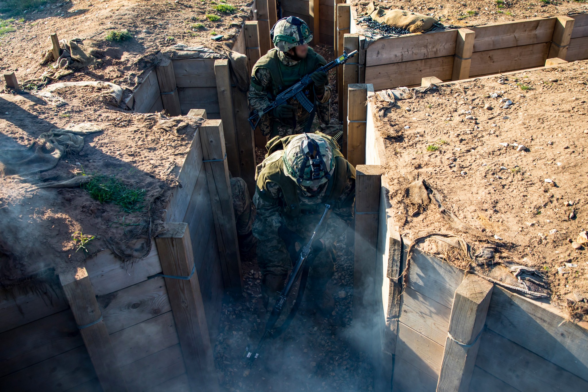 In the UK, future Ukrainian commanders are honing their trench assault skills