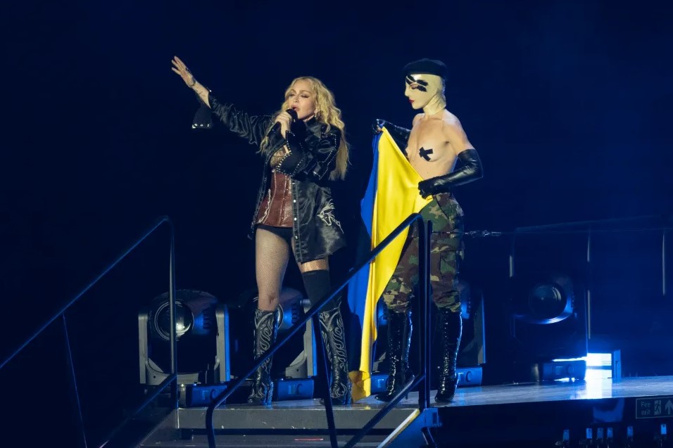Madonna kicked off her world tour, with a Ukrainian flag wearing hats by a Ukrainian designer